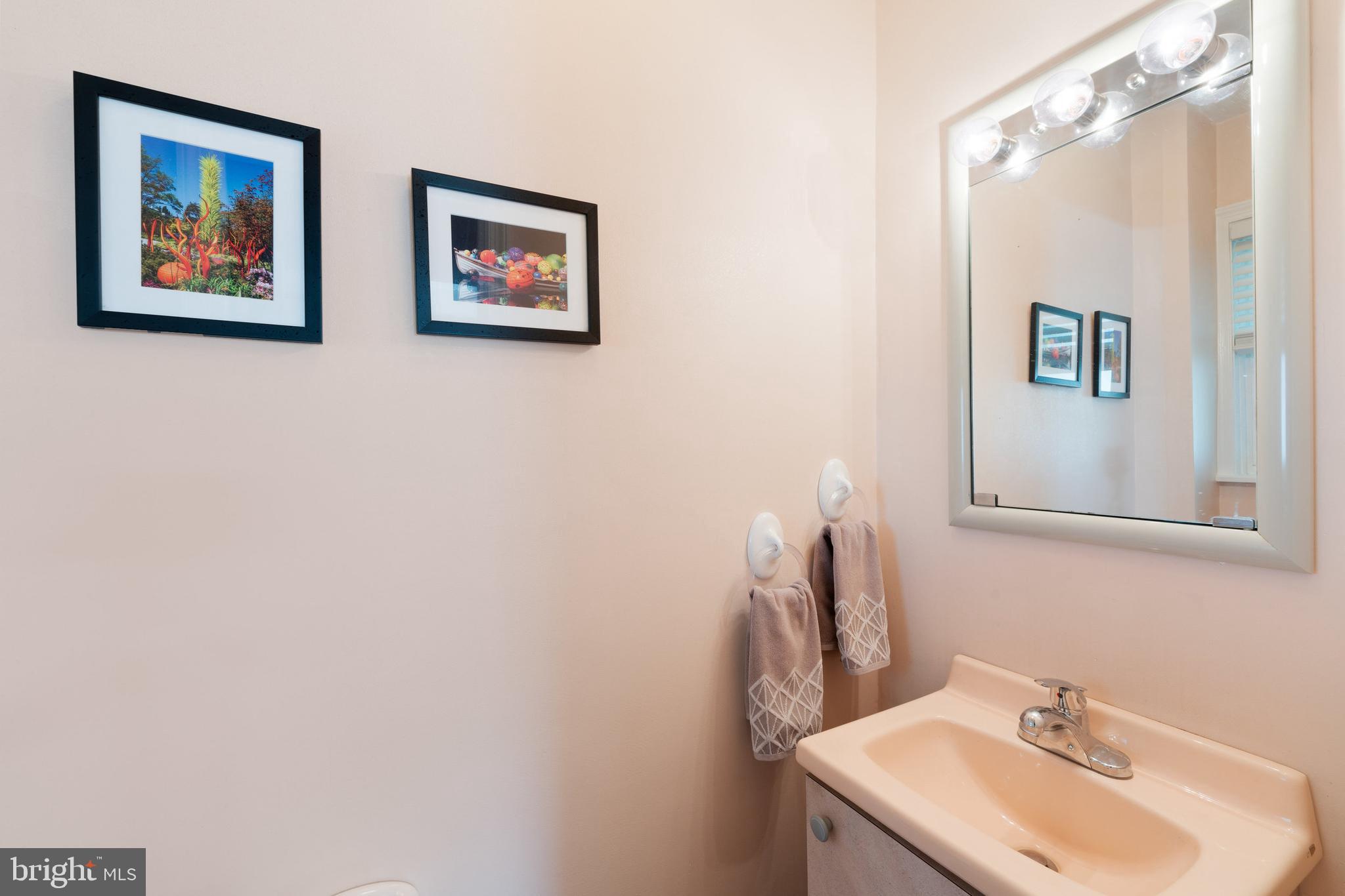 410 Crum Lynne Road Ridley Park, PA 19078 - Photo 21 of 43 a bathroom with a sink and a mirror