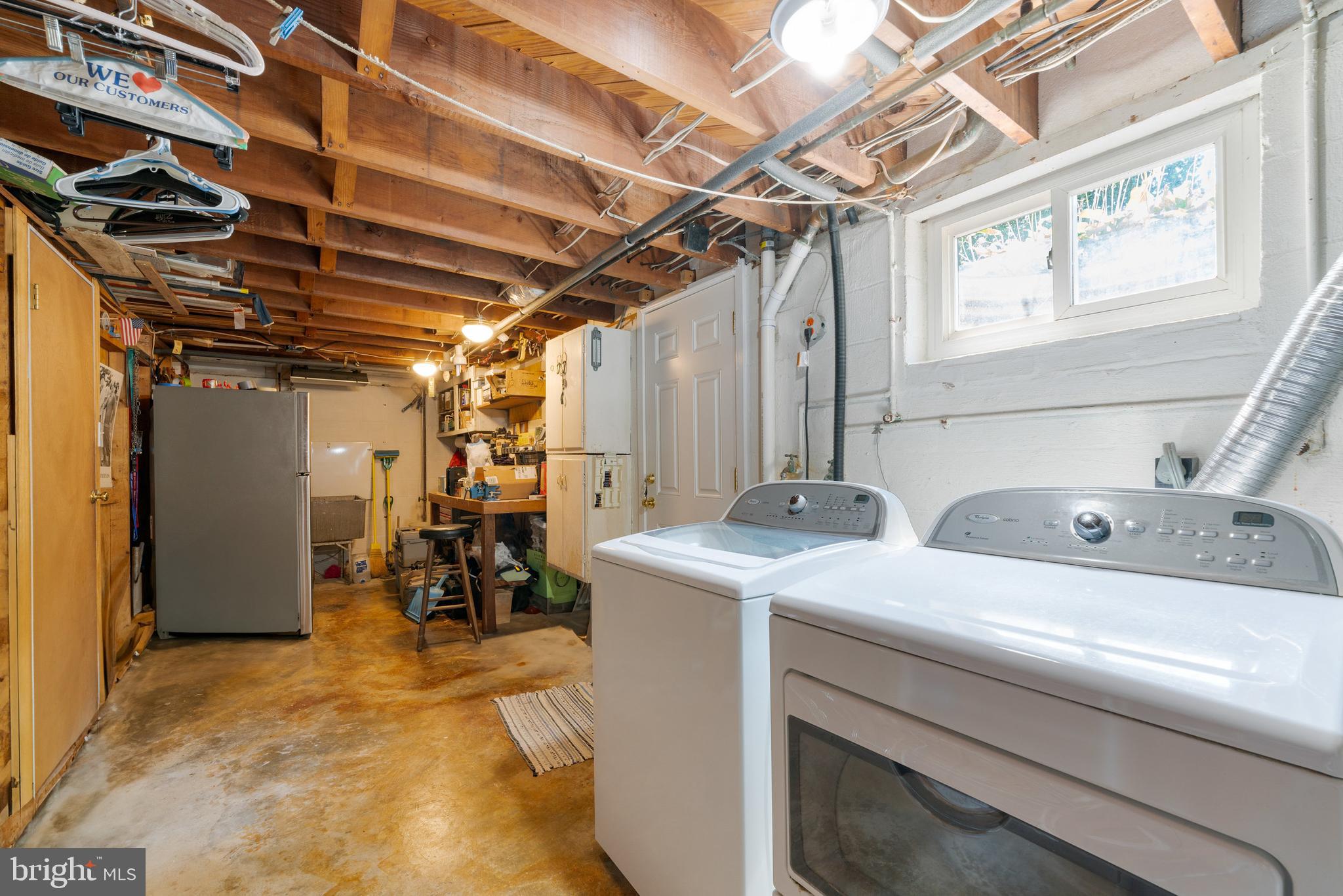 410 Crum Lynne Road Ridley Park, PA 19078 - Photo 30 of 43 a utility room with dryer and washer