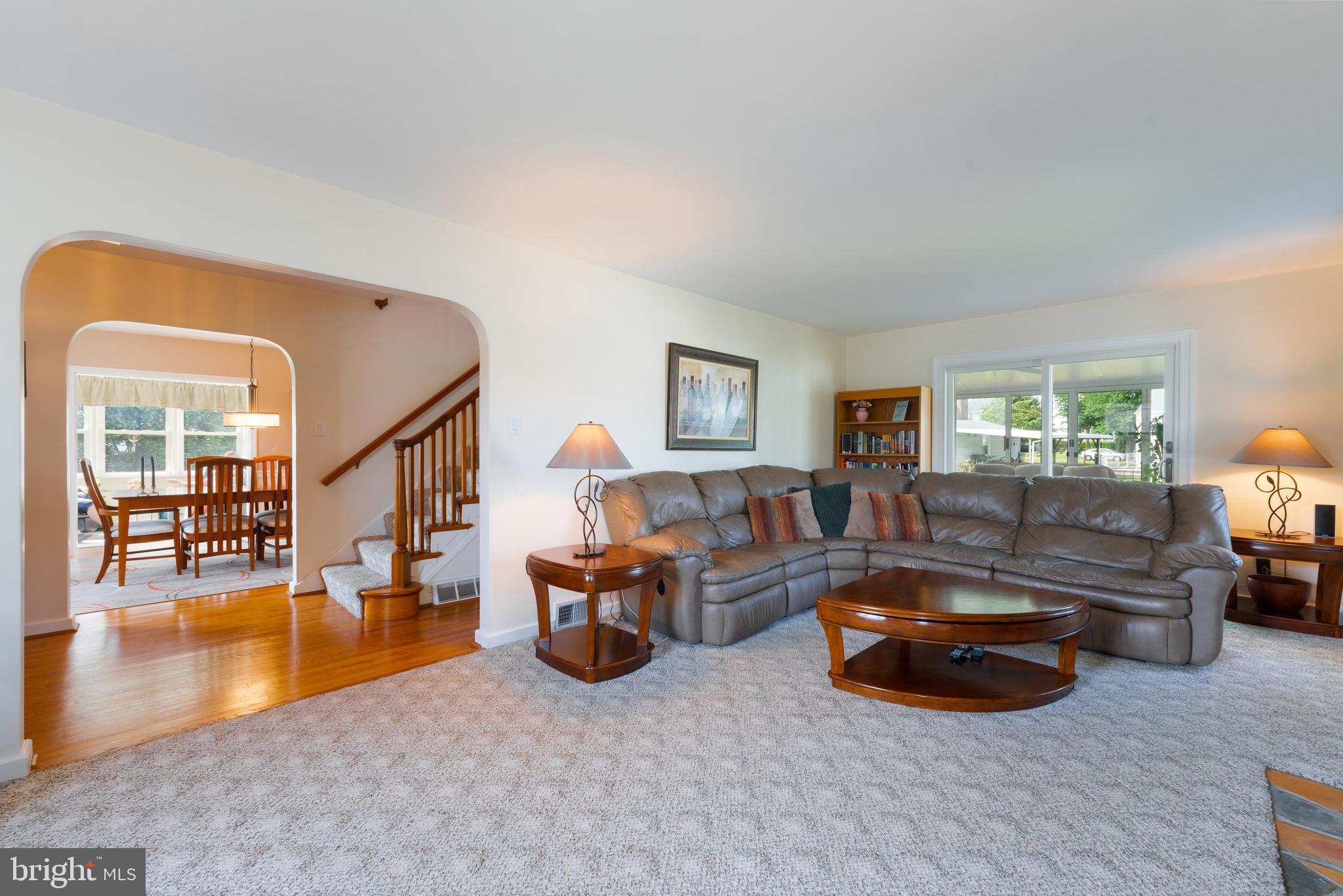 410 Crum Lynne Road Ridley Park, PA 19078 - Photo 10 of 43 a living room with furniture and a wooden floor