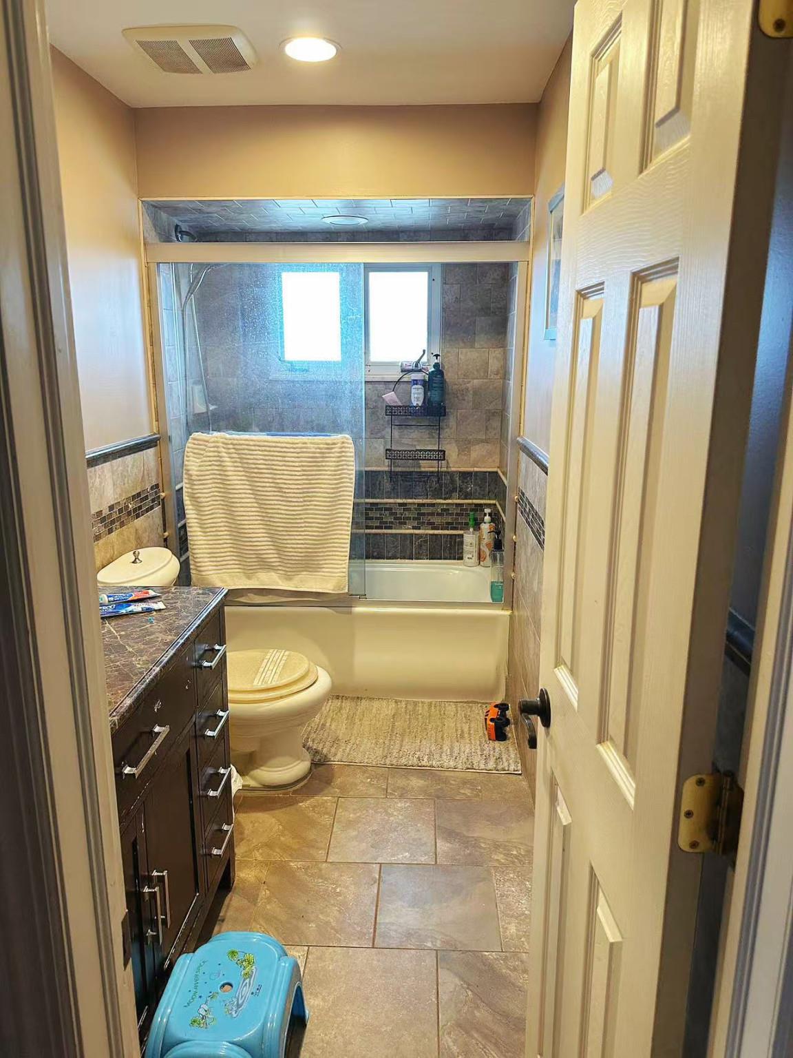 9 Furness Place Staten Island, NY 10314 - Photo 15 of 21 a bathroom with a granite countertop sink and a mirror