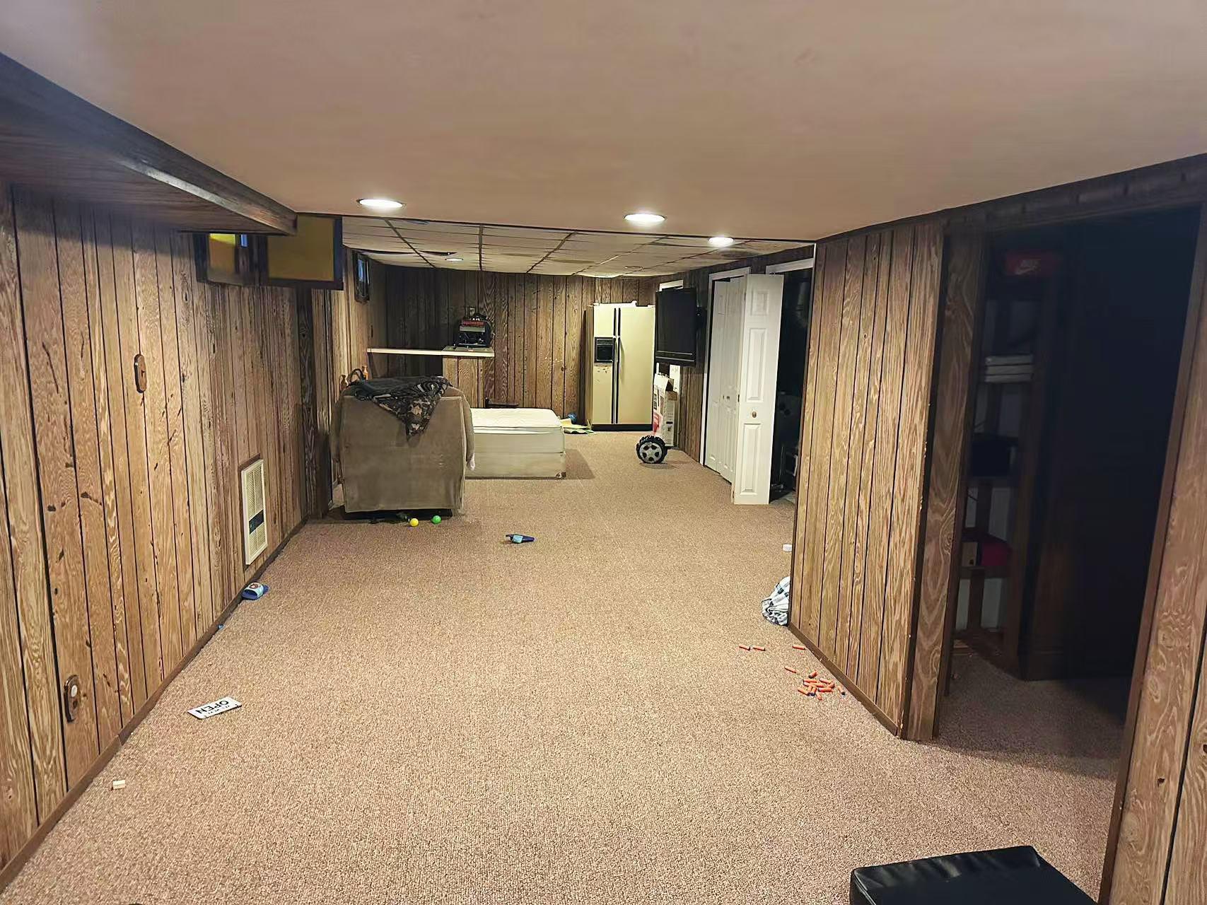 9 Furness Place Staten Island, NY 10314 - Photo 16 of 21 a view of hallway with furniture and a refrigerator