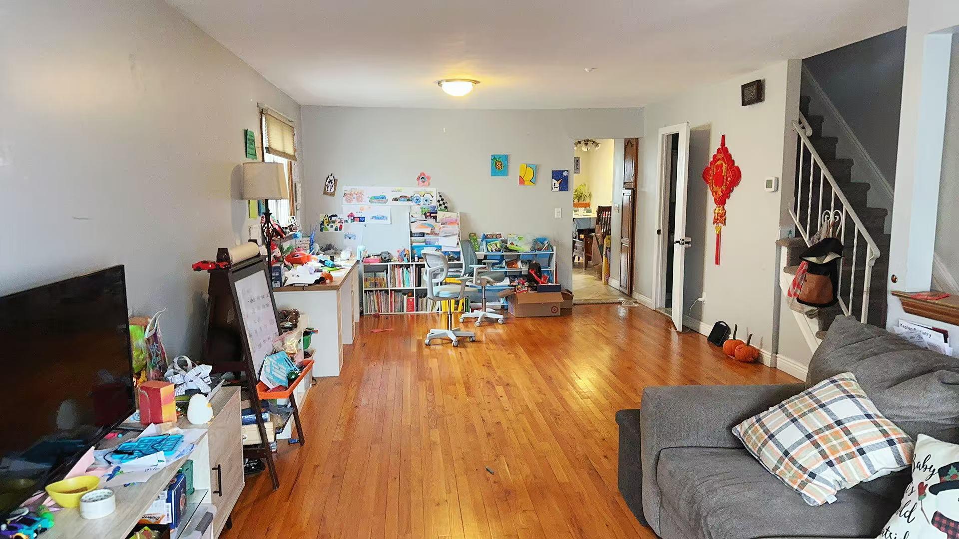 9 Furness Place Staten Island, NY 10314 - Photo 5 of 21 a living room with furniture and a flat screen tv