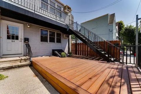 a front view of a house with a balcony