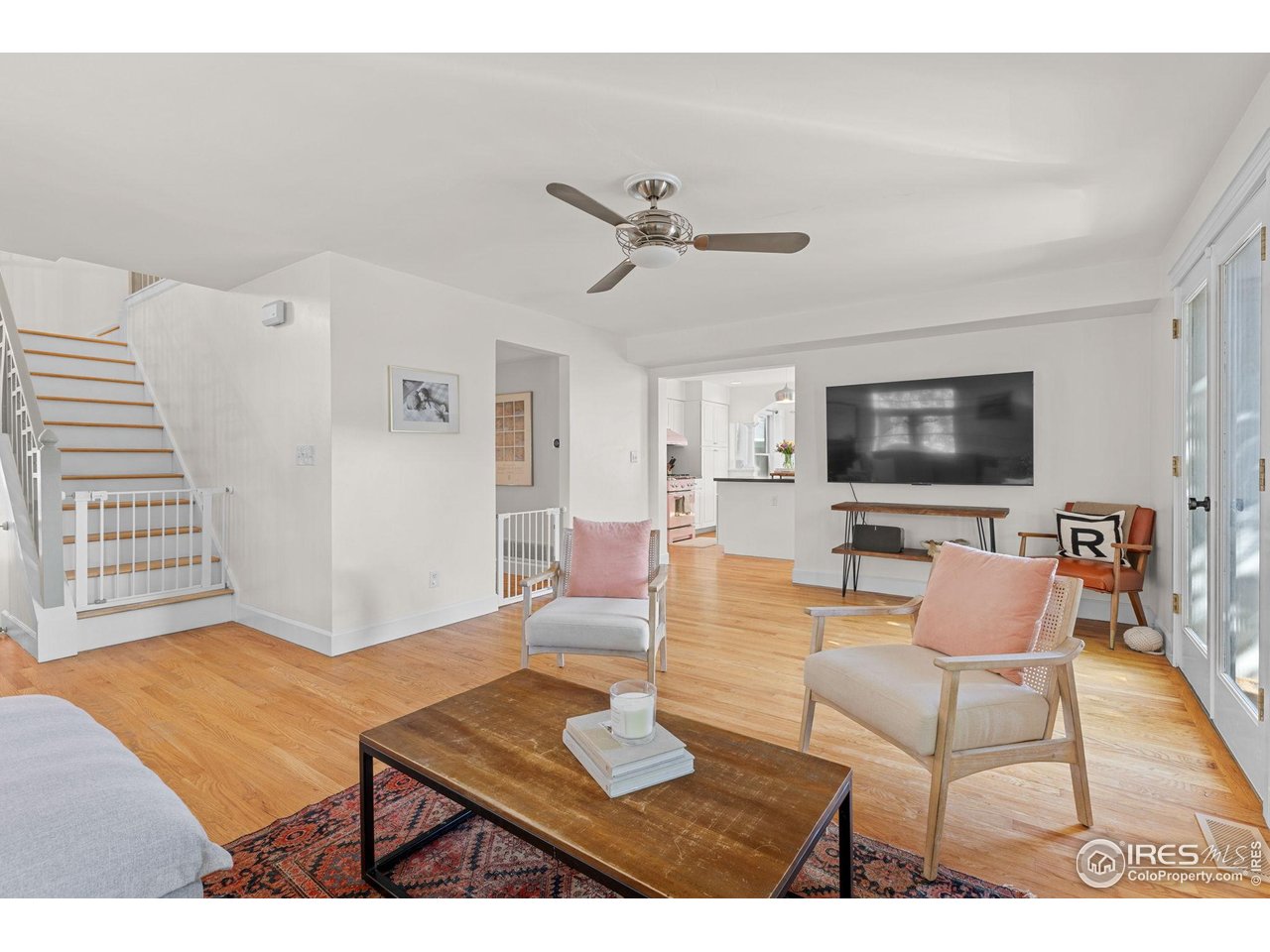 1133 Mapleton Avenue Boulder, CO 80304 - Photo 11 of 40 a living room with furniture and a flat screen tv