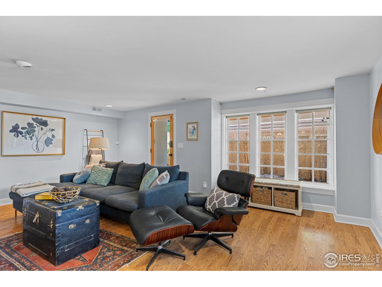 1133 Mapleton Avenue Boulder, CO 80304 - Photo 33 of 40 a living room with furniture rug and window