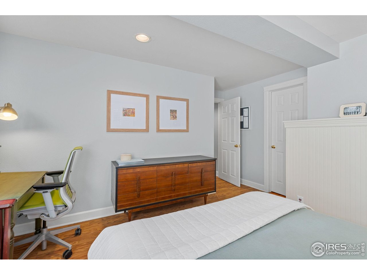 1133 Mapleton Avenue Boulder, CO 80304 - Photo 37 of 40 a bedroom with a bed and furniture