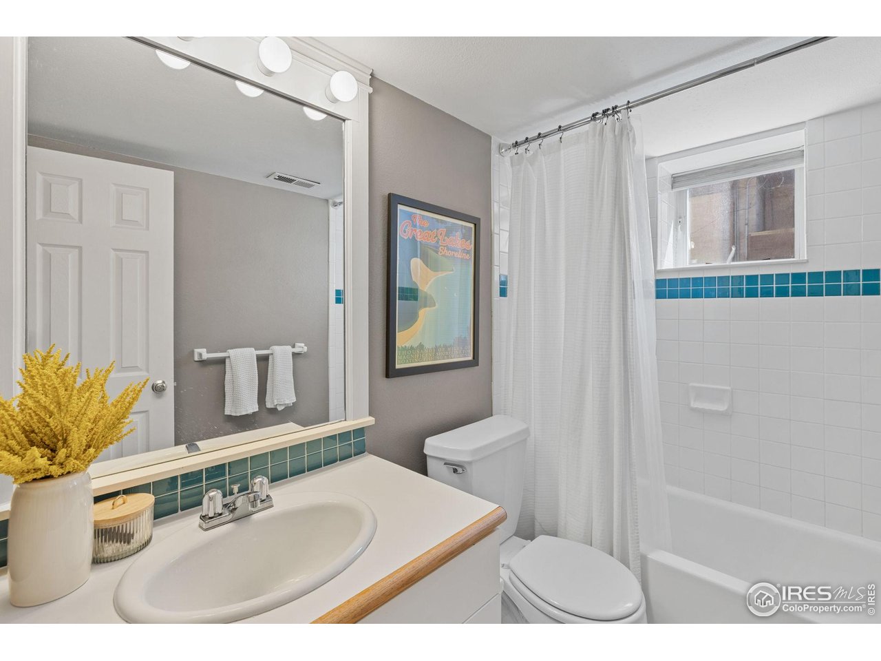 1133 Mapleton Avenue Boulder, CO 80304 - Photo 38 of 40 a bathroom with a sink a toilet and shower