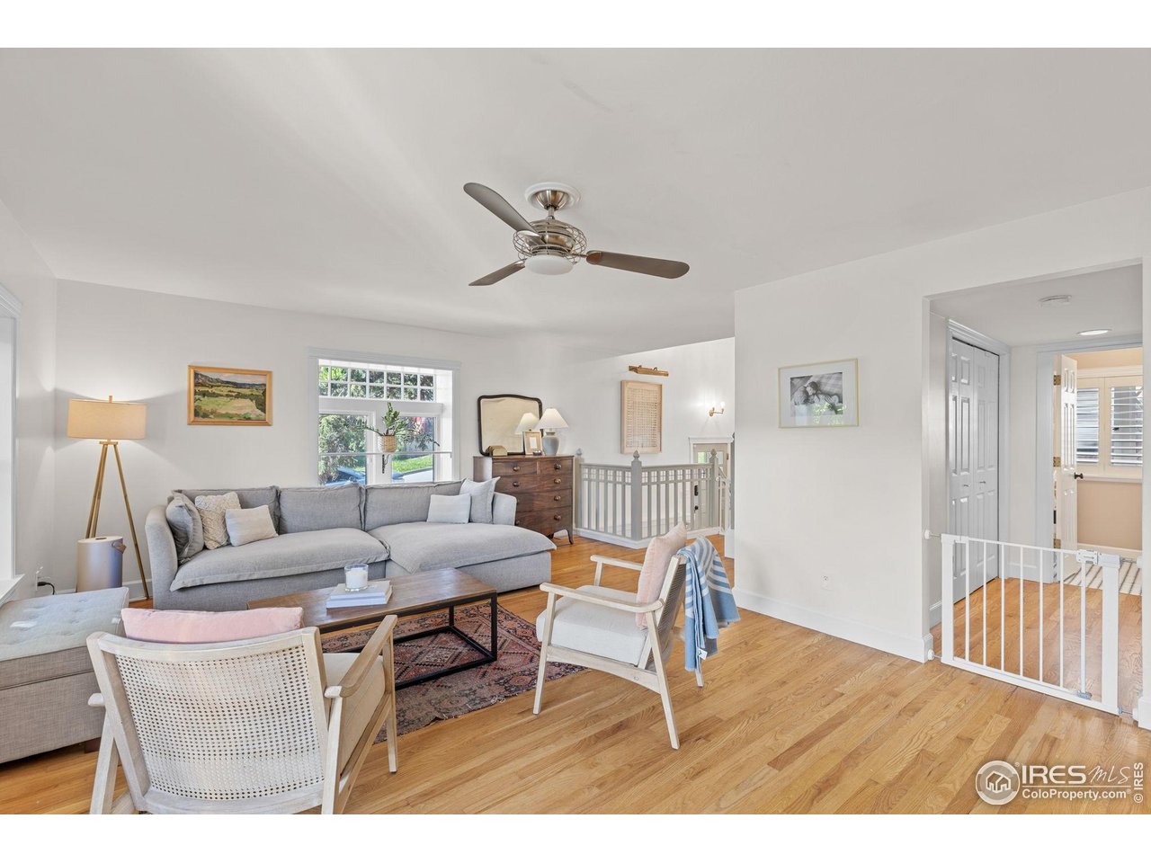 1133 Mapleton Avenue Boulder, CO 80304 - Photo 10 of 40 a living room with furniture a window and a table