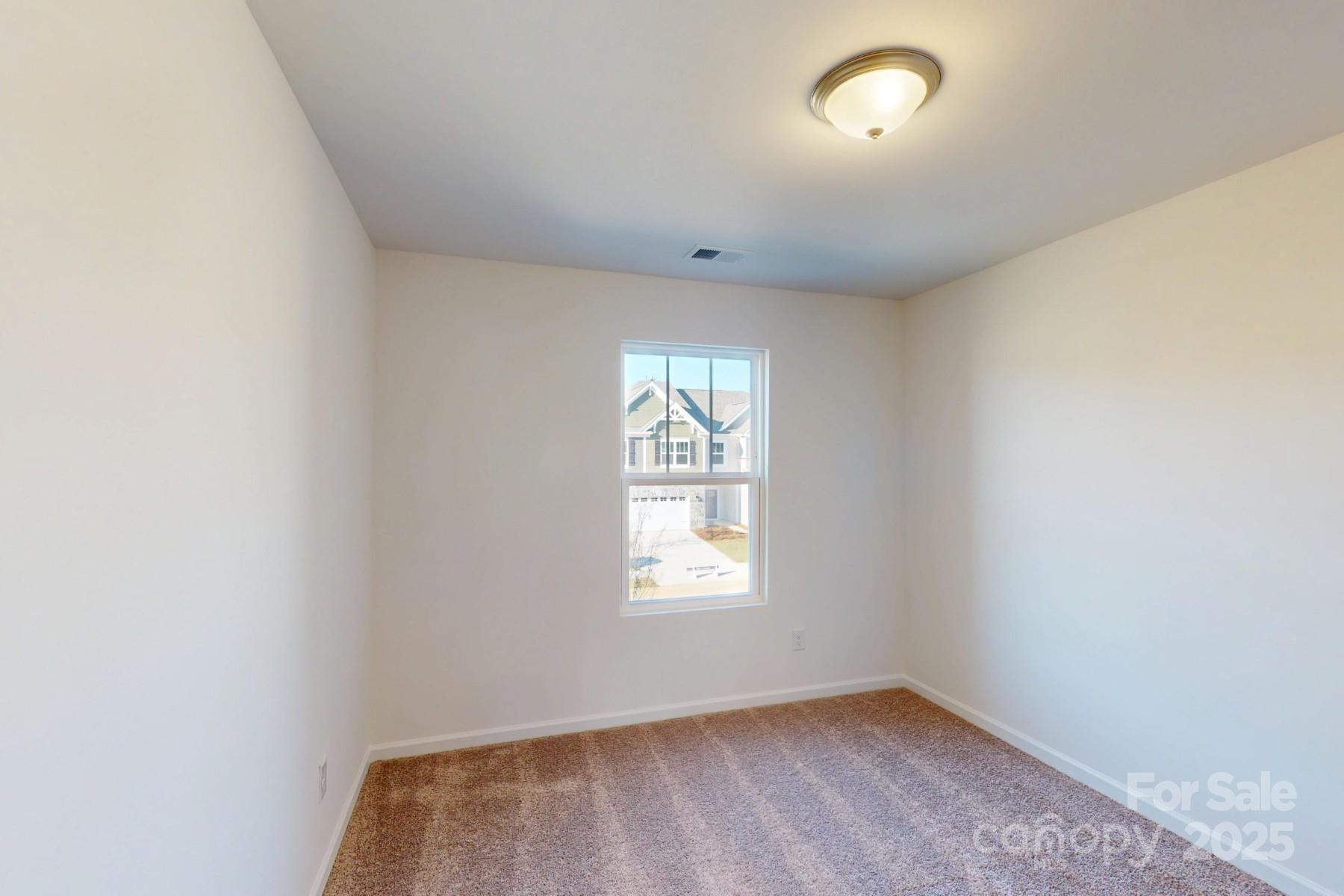 1129 Overbrook Place Wingate, NC 28174 - Photo 15 of 21 an empty room with a window