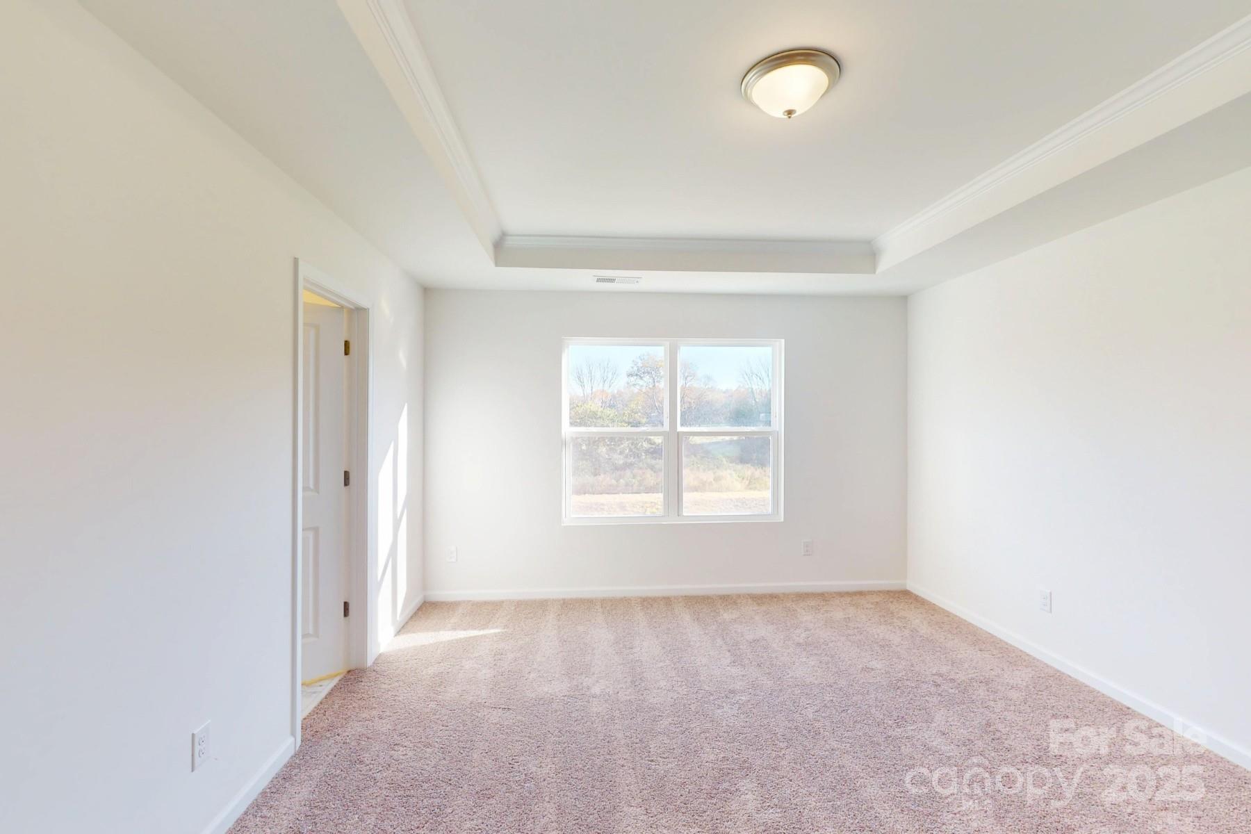 1129 Overbrook Place Wingate, NC 28174 - Photo 18 of 21 an empty room with windows