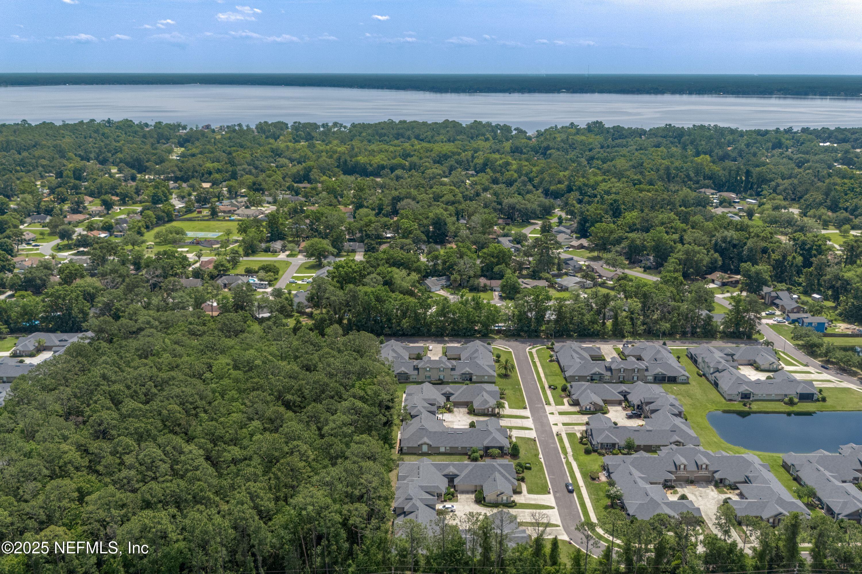 2120 Stone Creek Drive, Unit E Fleming Island, FL 32003 - Photo 38 of 66 an aerial view of multiple house