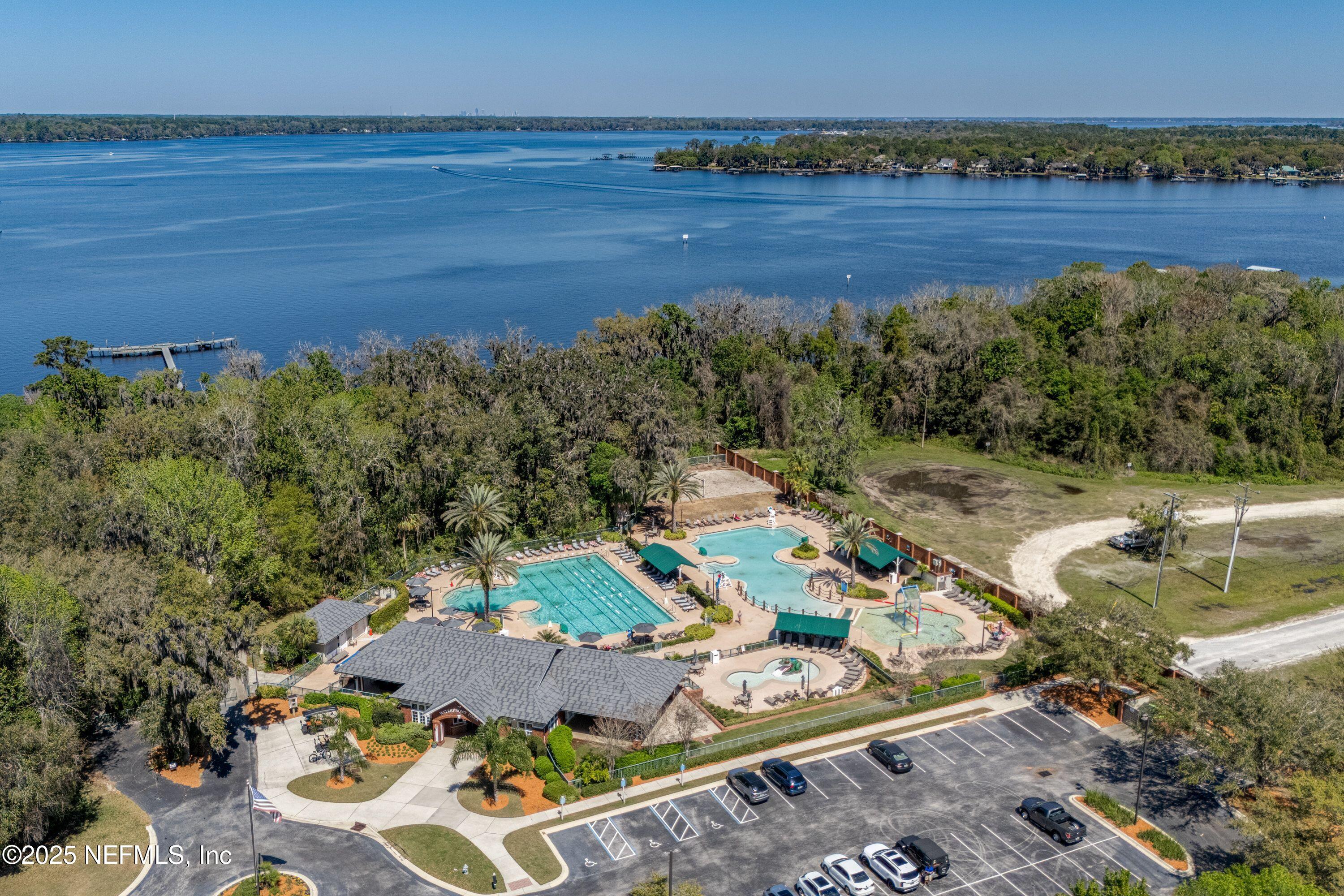 2120 Stone Creek Drive, Unit E Fleming Island, FL 32003 - Photo 55 of 66 an aerial view of a house with garden space and ocean view