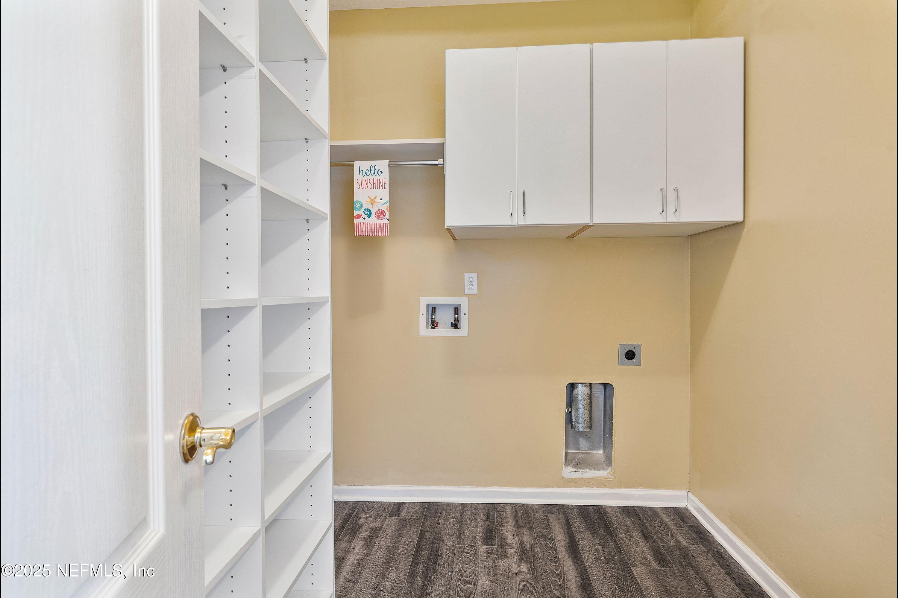 2120 Stone Creek Drive, Unit E Fleming Island, FL 32003 - Photo 8 of 66 a view of walk in closet with white walls
