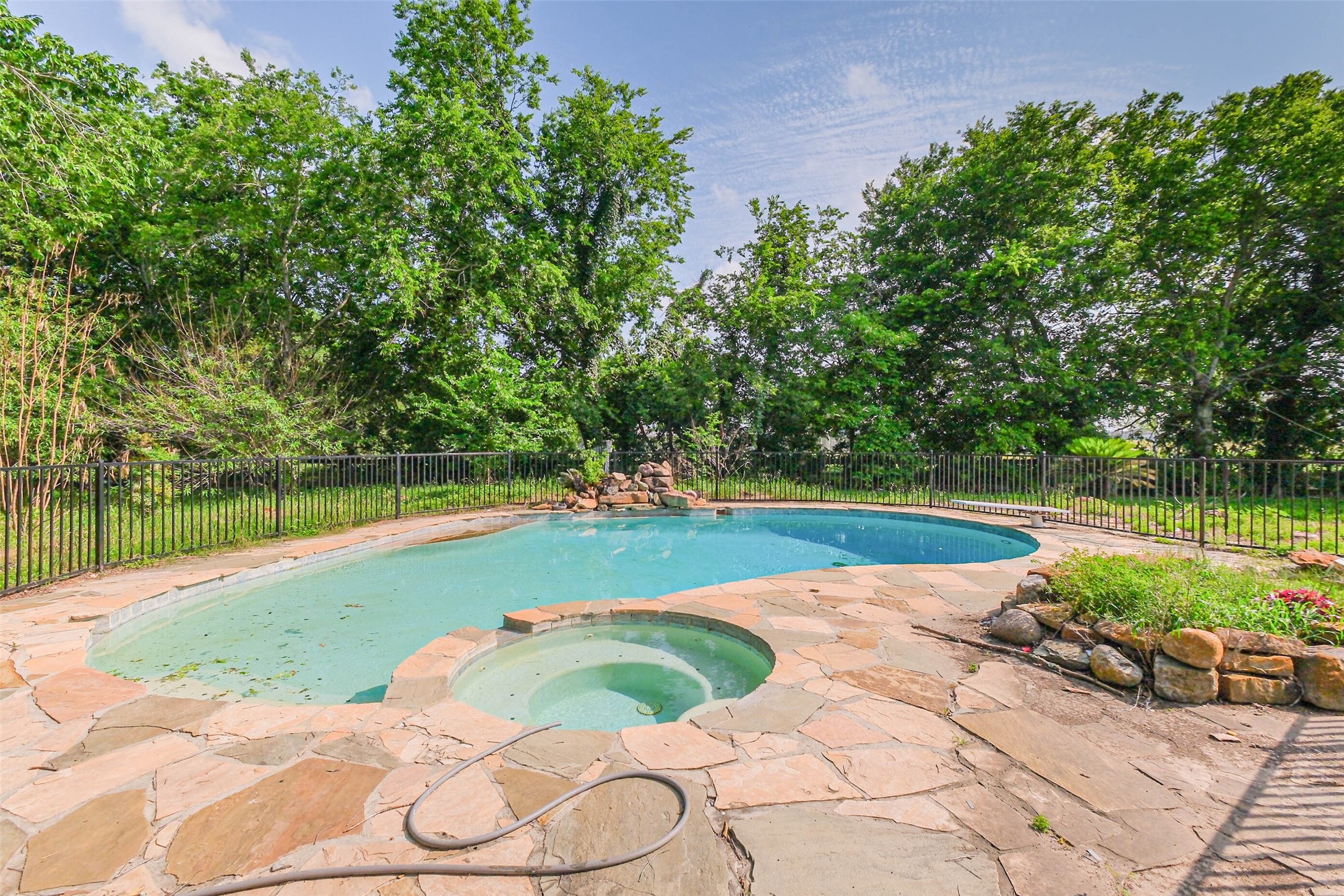 11019 Clodine Road Sugar Land, TX 77498 - Photo 34 of 39 a view of a swimming pool and a yard