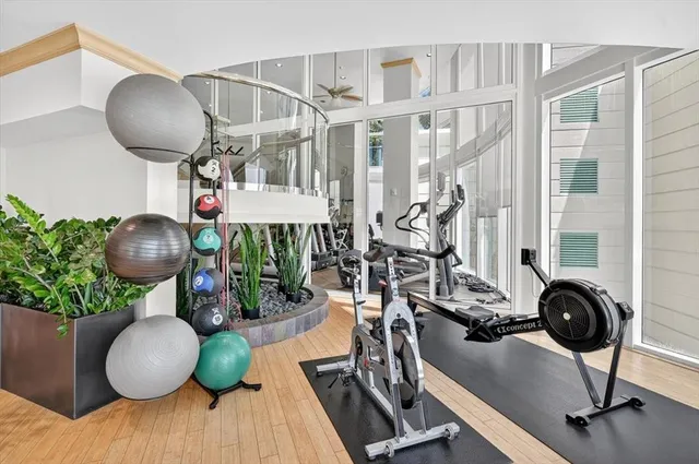 walk in closet with white walls