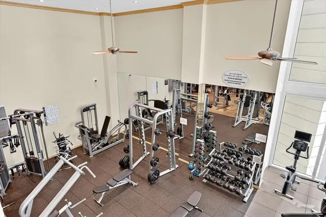a view of swimming pool with outdoor seating and plants