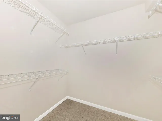 a view of balcony with wooden floor