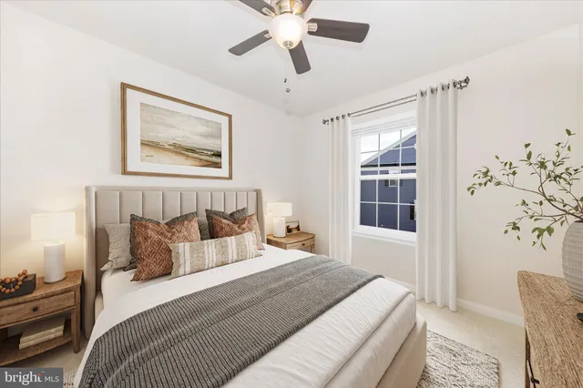 a view of a house with a barbeque and wooden stairs