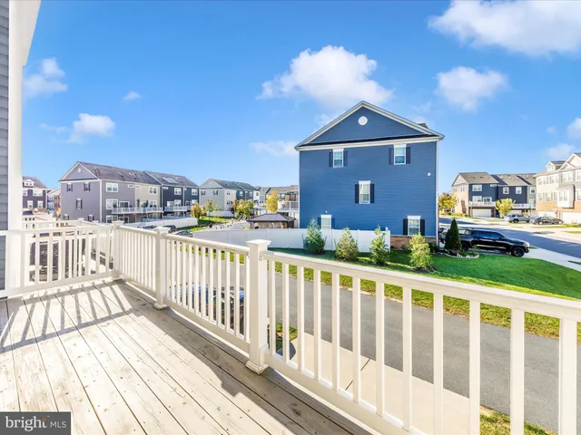 a view of house with yard outdoor seating and green space