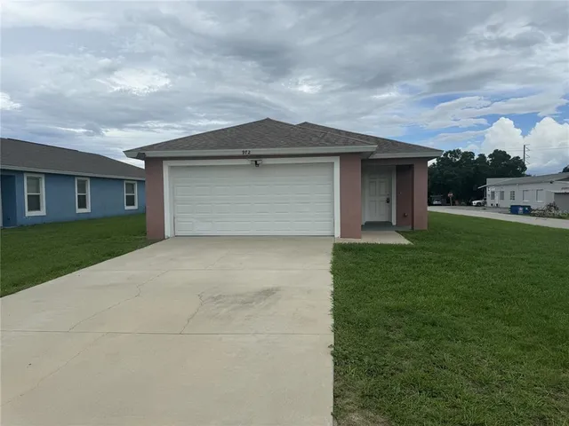 a front view of house with yard