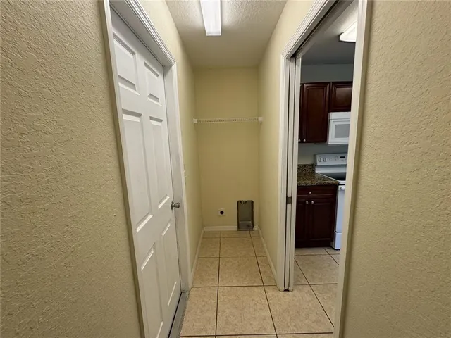 a bathroom with a shower and a mirror