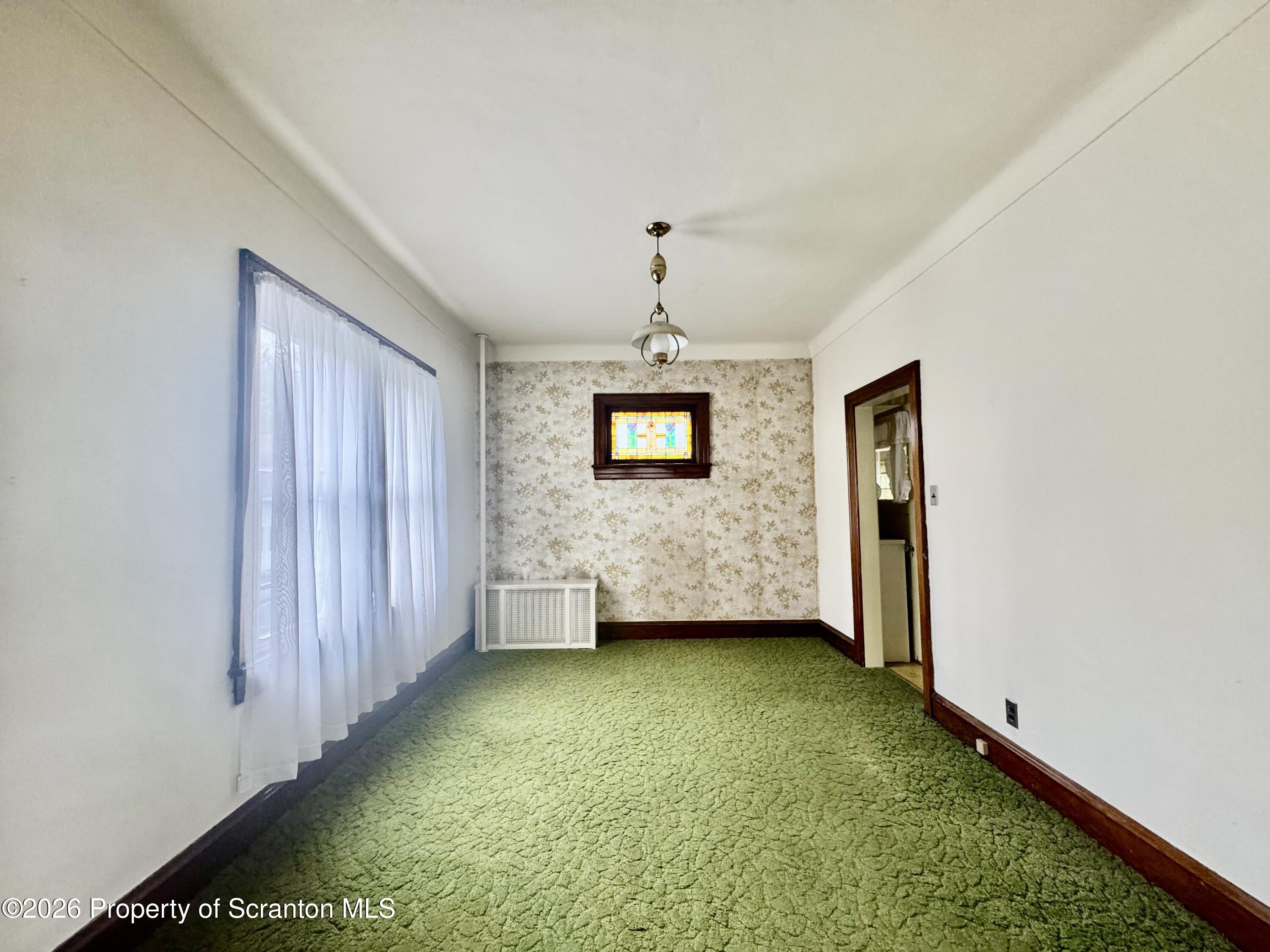 2120 Myrtle Street Scranton, PA 18510 - Photo 17 of 42 a view of an empty room with a window