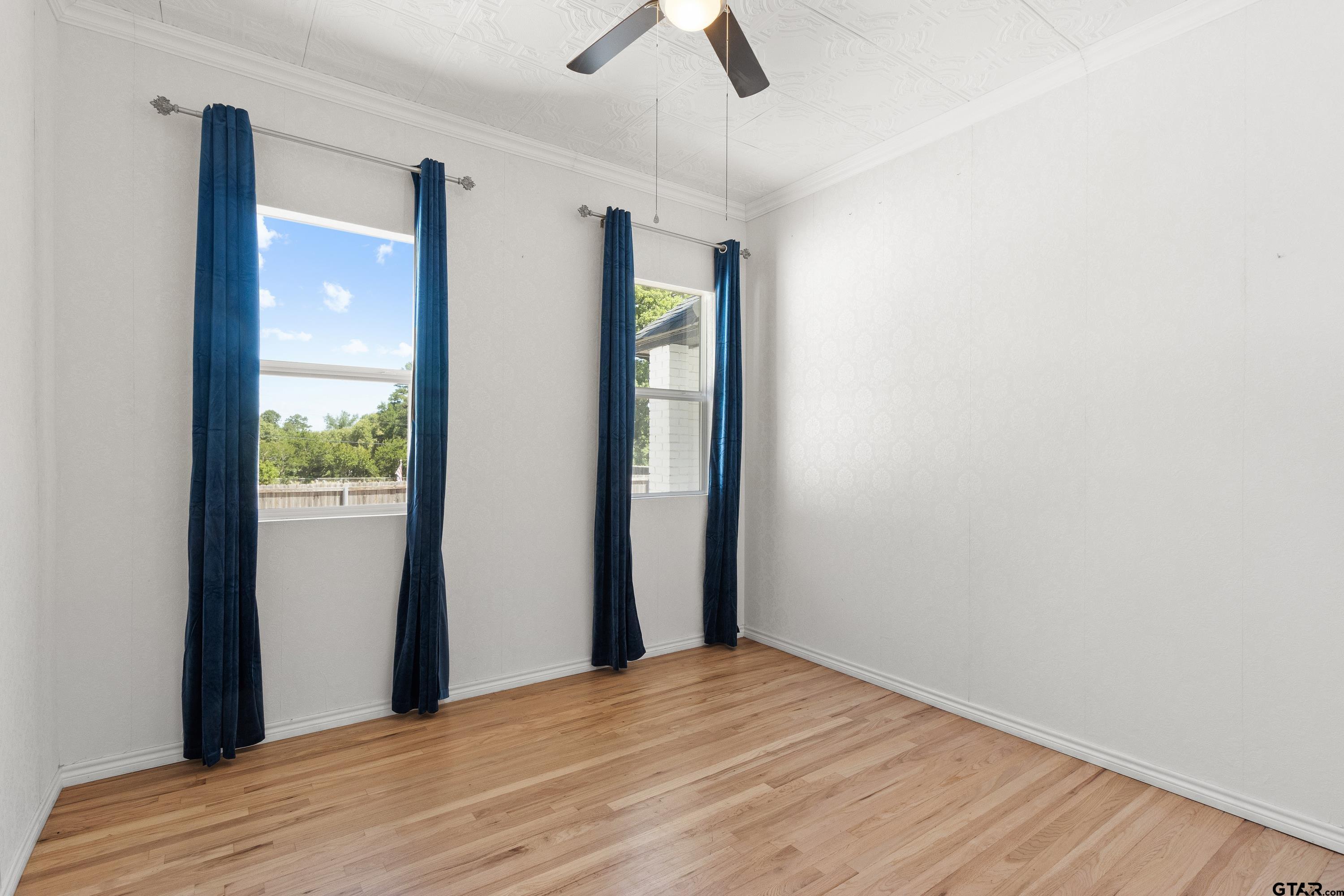 4456 Farm To Market Road 2767 Tyler, TX 75708 - Photo 14 of 46 a view of empty room with ceiling fan