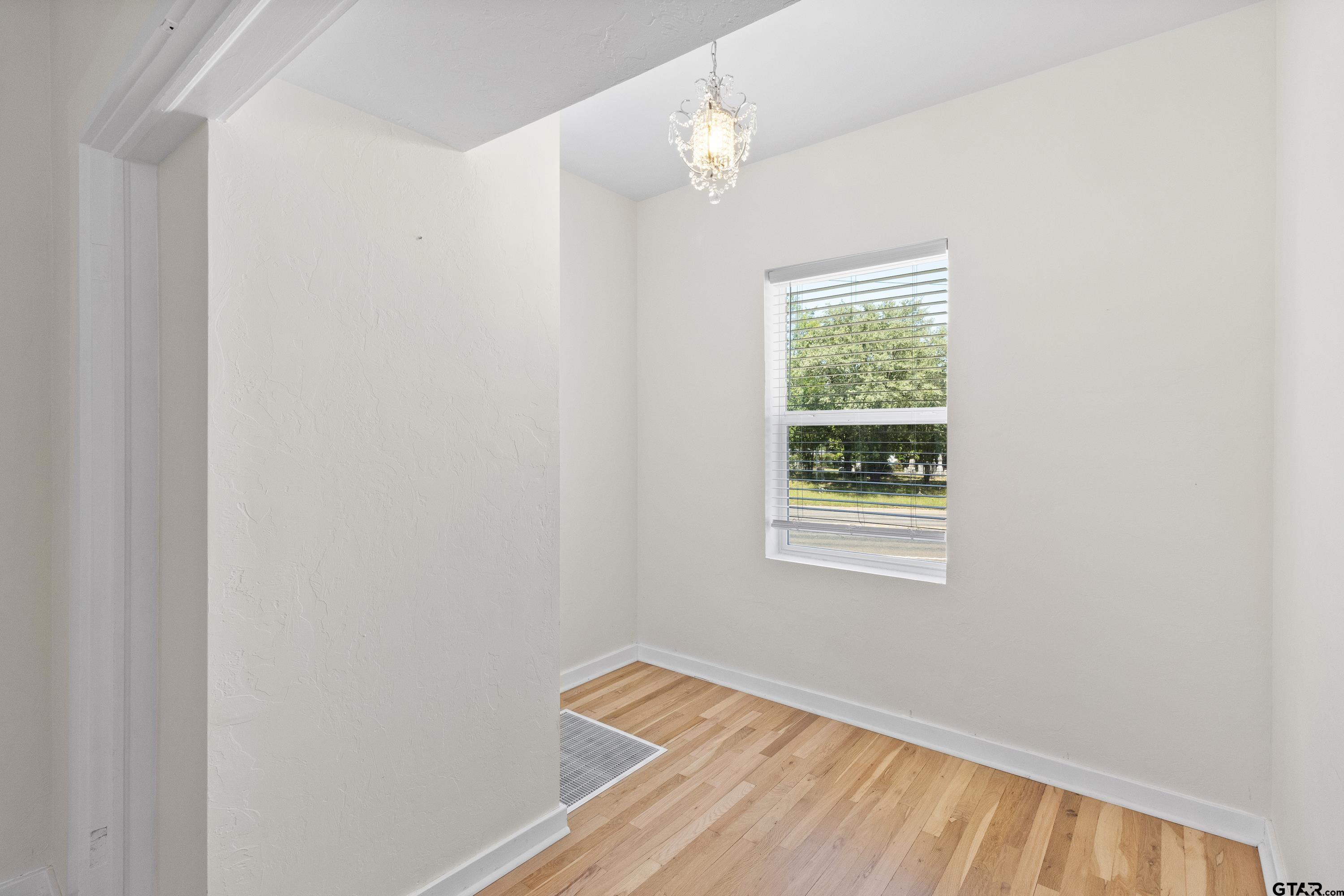 4456 Farm To Market Road 2767 Tyler, TX 75708 - Photo 22 of 46 a view of an empty room with a window