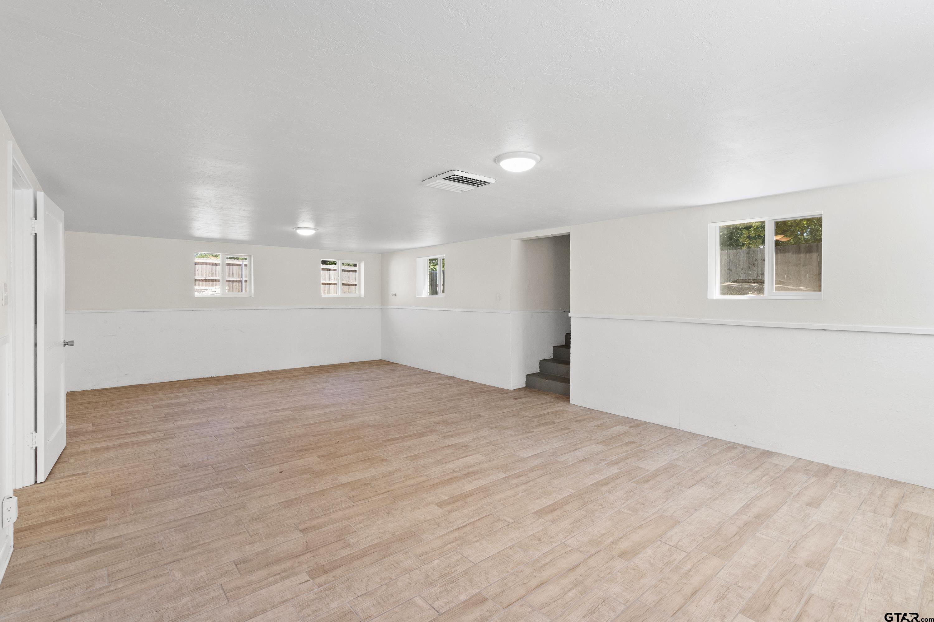 4456 Farm To Market Road 2767 Tyler, TX 75708 - Photo 26 of 46 a view of an empty room with a window