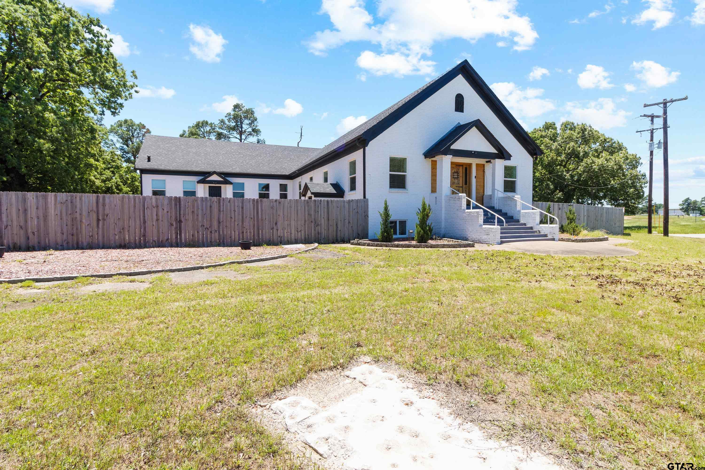 4456 Farm To Market Road 2767 Tyler, TX 75708 - Photo 3 of 46 a view of a house with a yard