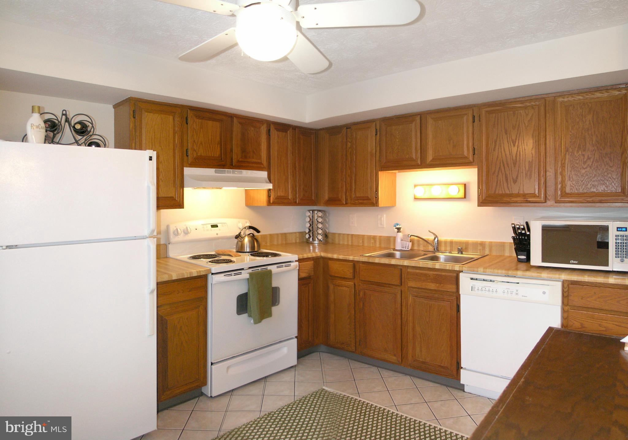 2317 Middle Creek Lane Reston, VA 20191 - Photo 12 of 30 Kitchen with pass-thru breakfast bar