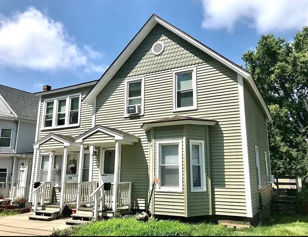 114 North Street Ware, MA 01082 - Photo 1 of 25 a view of a white building among the palm trees