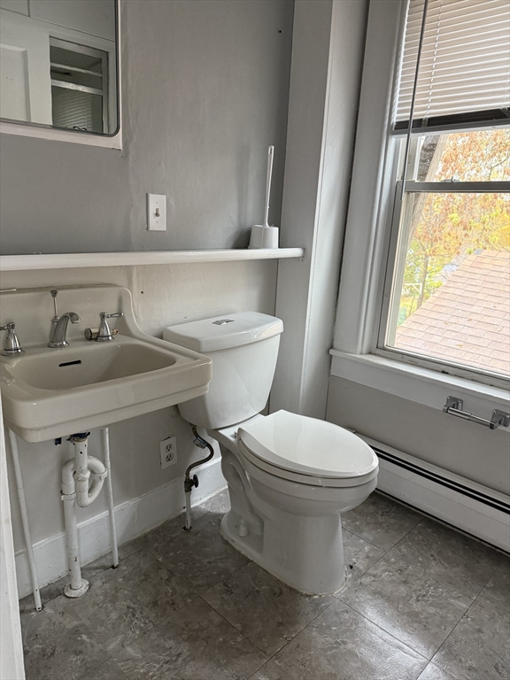 114 North Street Ware, MA 01082 - Photo 19 of 25 a bathroom with a sink toilet and window