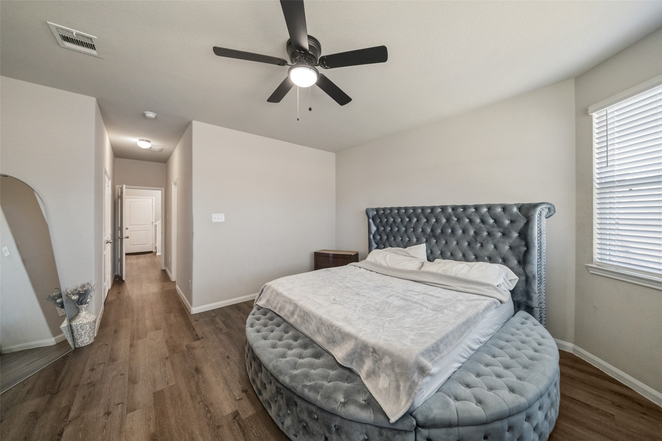 2302 Raider Drive Conroe, TX 77301 - Photo 13 of 25 a large white bed in a small room