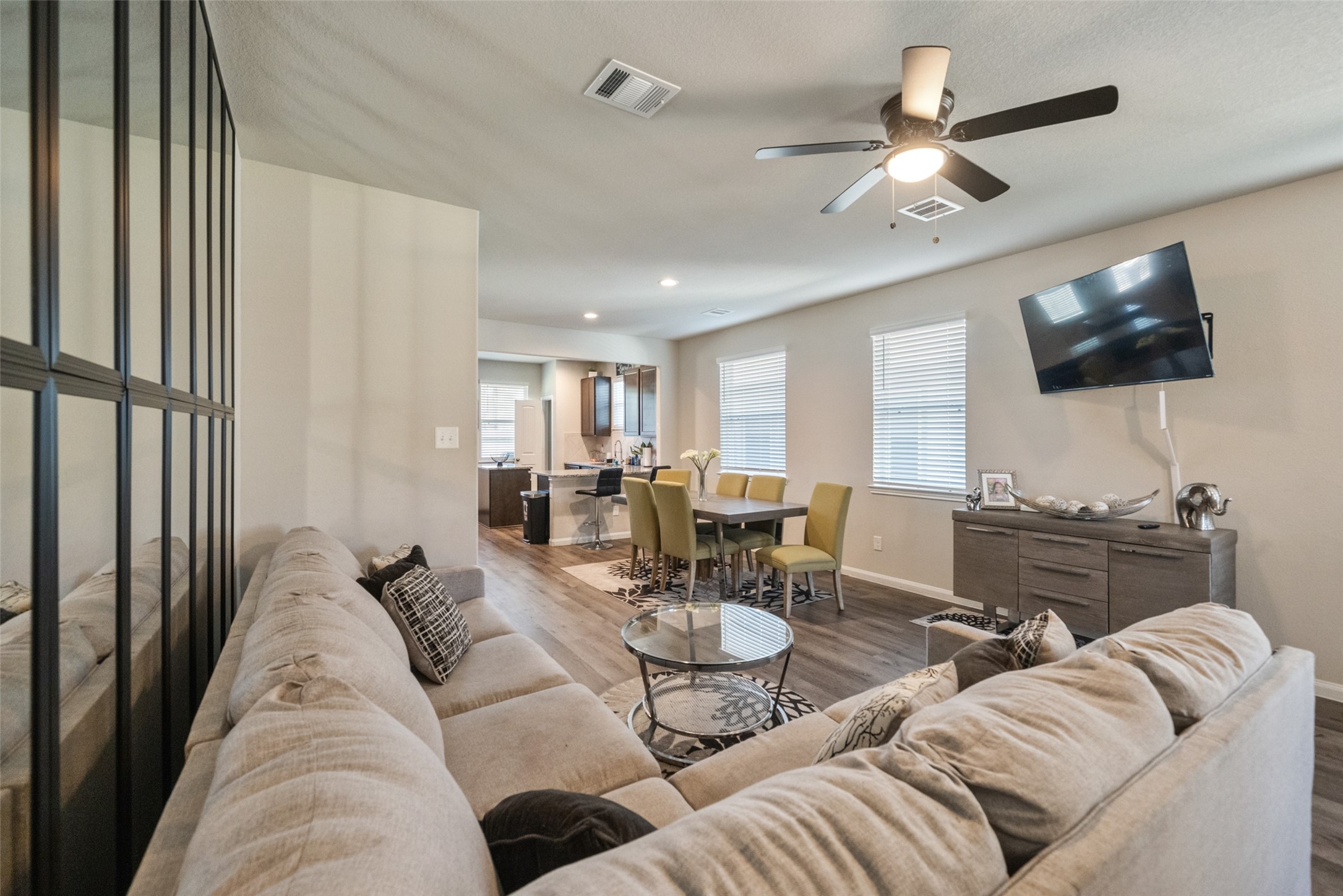 2302 Raider Drive Conroe, TX 77301 - Photo 14 of 25 a living room with furniture and a flat screen tv