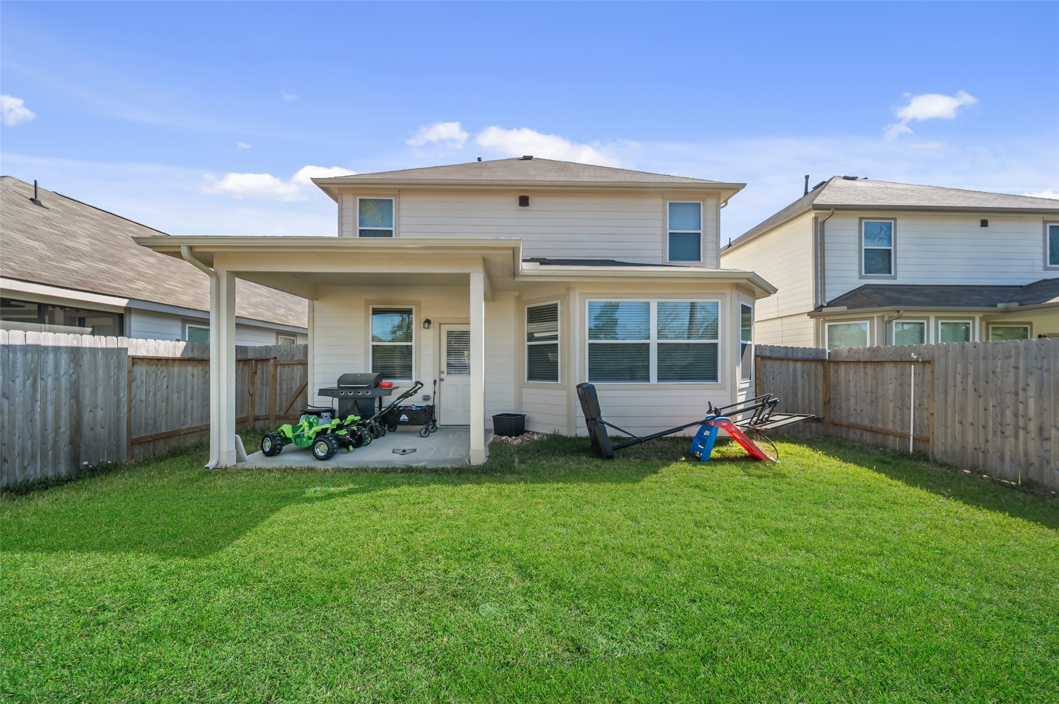 2302 Raider Drive Conroe, TX 77301 - Photo 25 of 25 a view of a house with a yard and porch