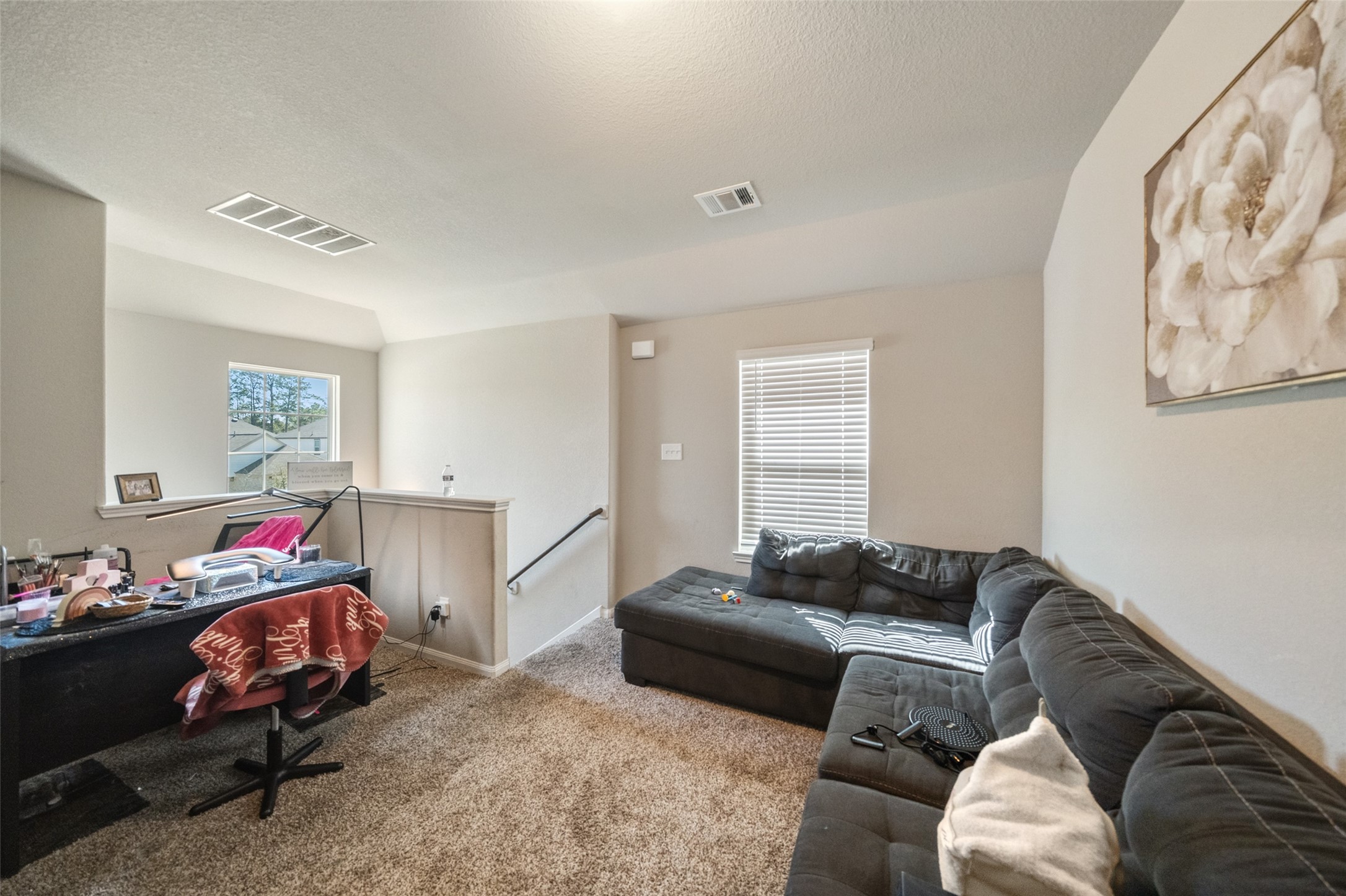 2302 Raider Drive Conroe, TX 77301 - Photo 5 of 25 a bedroom with furniture and a couch