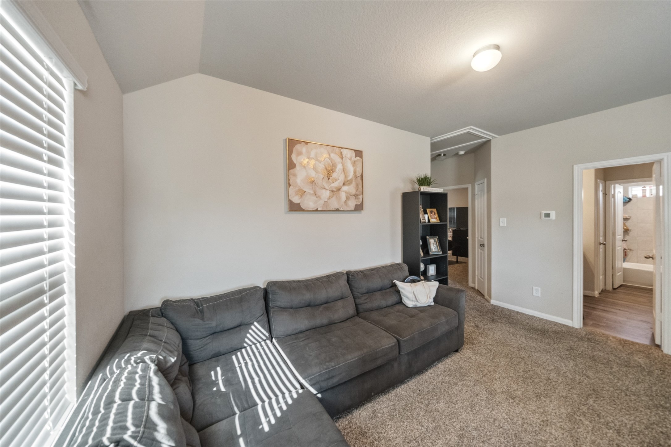 2302 Raider Drive Conroe, TX 77301 - Photo 9 of 25 a living room with furniture and a window