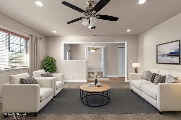 a kitchen with stainless steel appliances granite countertop a stove sink microwave and refrigerator