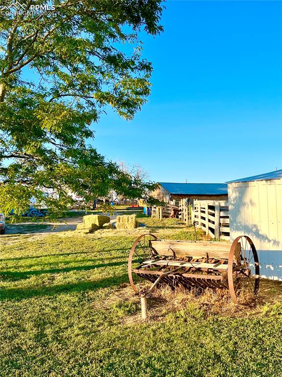 34650 Bellemont Road Yoder, CO 80864 - Photo 12 of 29 a view of a swimming pool with an ocean view