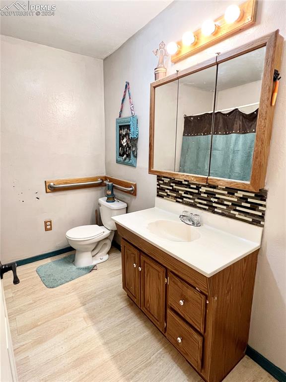 34650 Bellemont Road Yoder, CO 80864 - Photo 27 of 29 a bathroom with a sink and a mirror