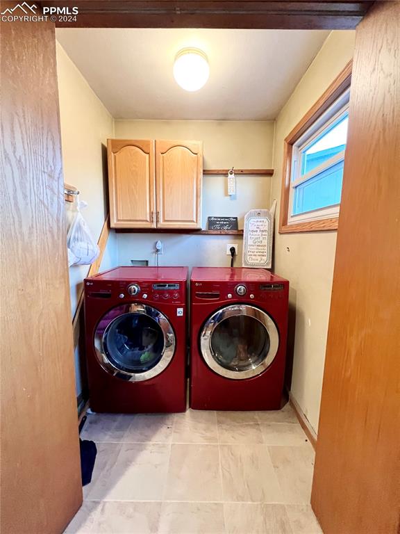 34650 Bellemont Road Yoder, CO 80864 - Photo 29 of 29 a bathroom with a sink and a washer dryer