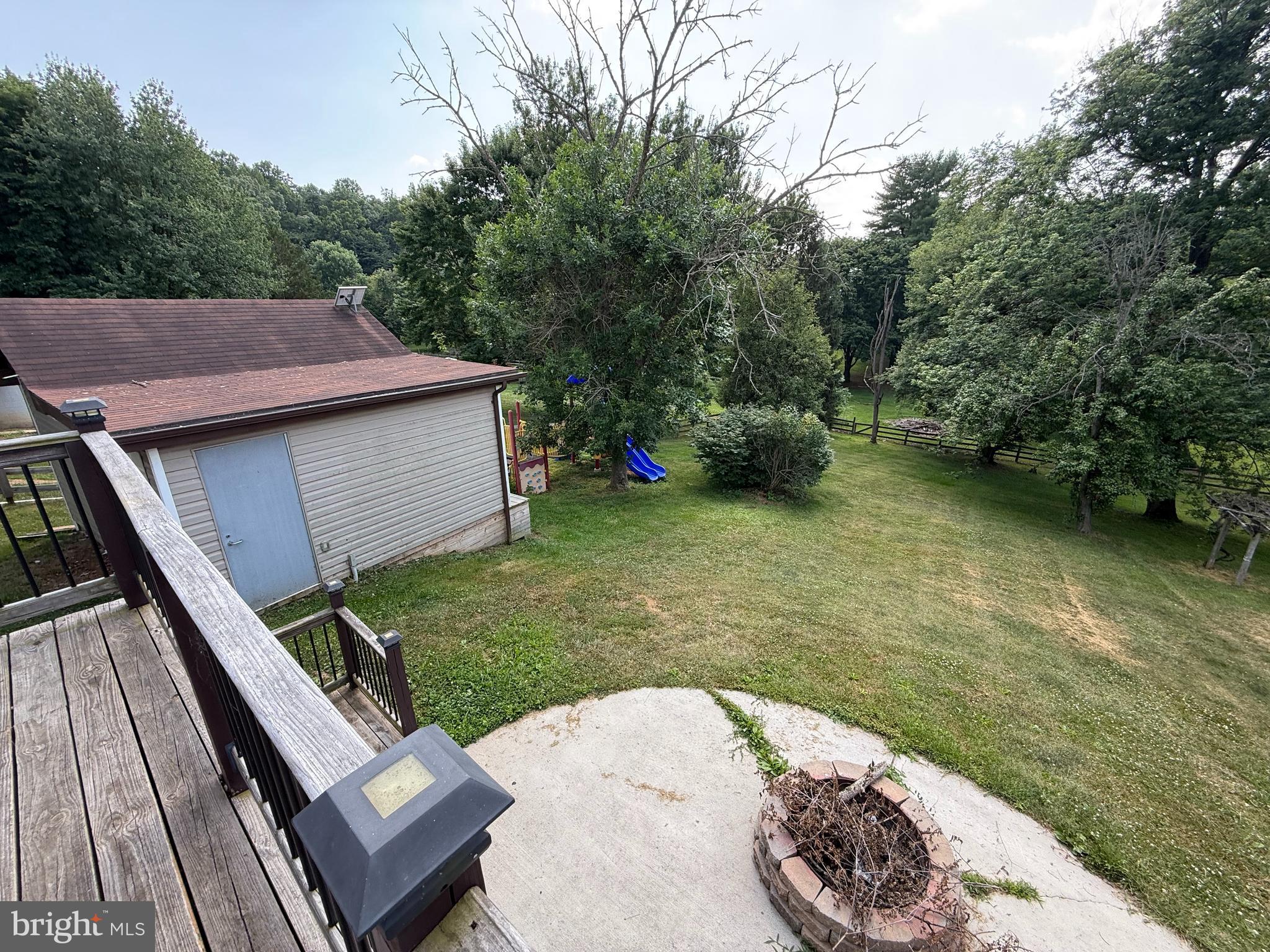 858 Star Court Union Bridge, MD 21791 - Photo 8 of 37 a view of a backyard with a sink and a garden