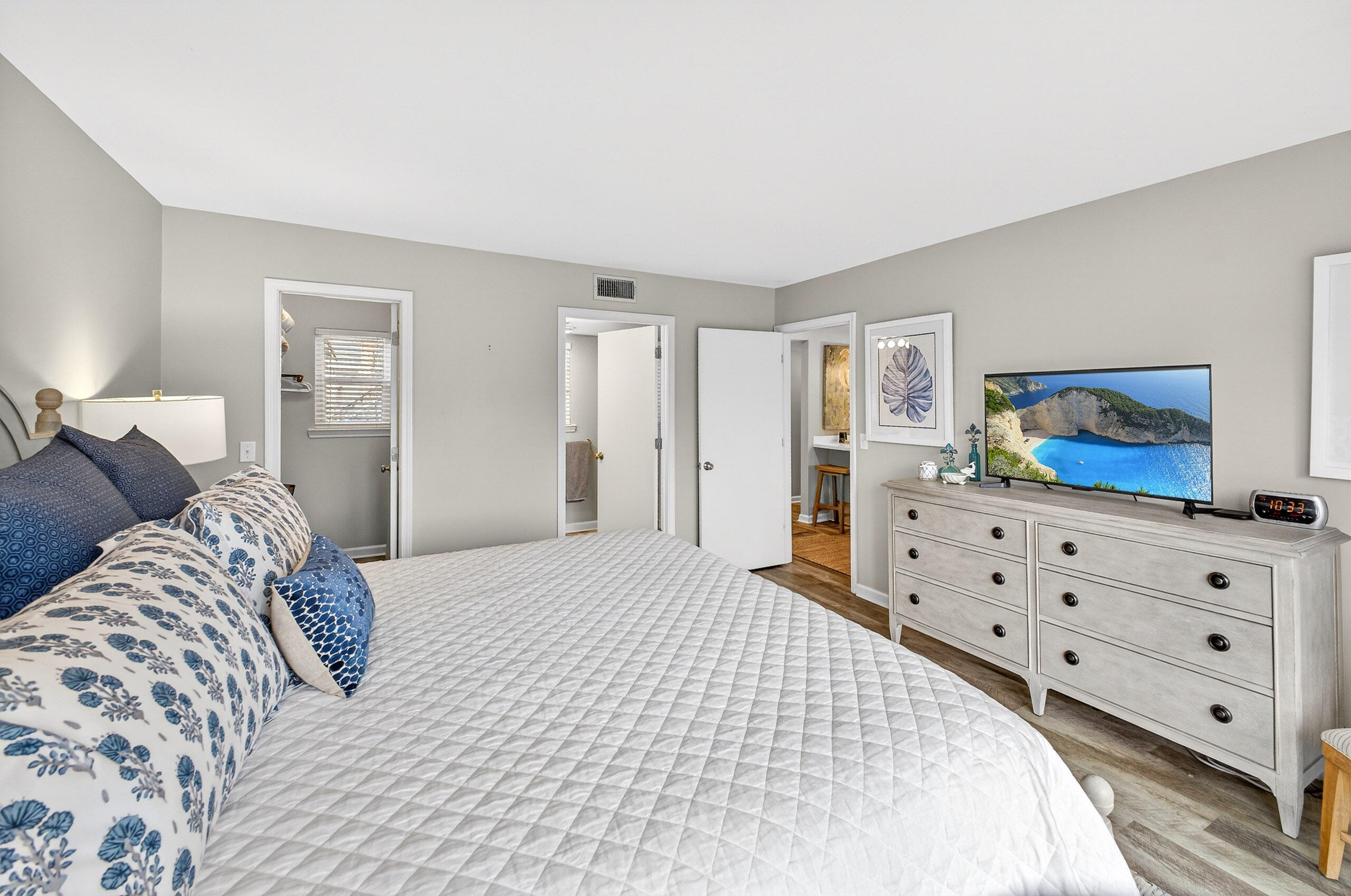 900 Harbour Point Lane, Unit 900 Miramar Beach, FL 32550 - Photo 19 of 64 a bedroom with a bed and a dresser