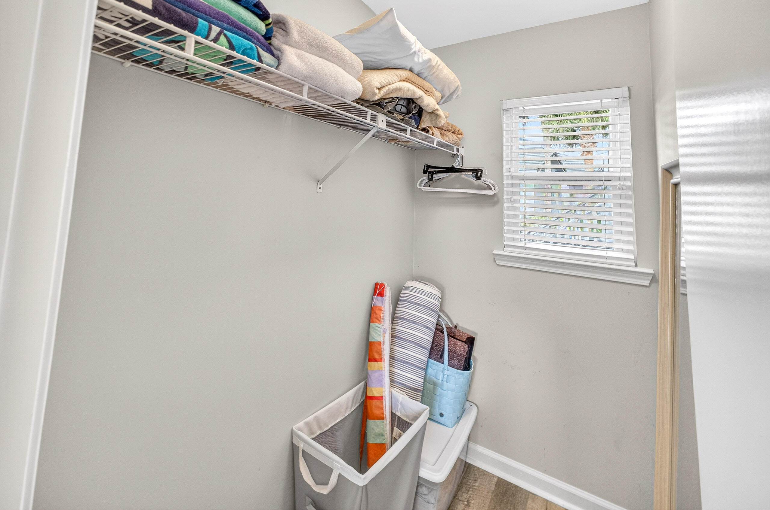 900 Harbour Point Lane, Unit 900 Miramar Beach, FL 32550 - Photo 21 of 64 a room with a wooden floor and a window