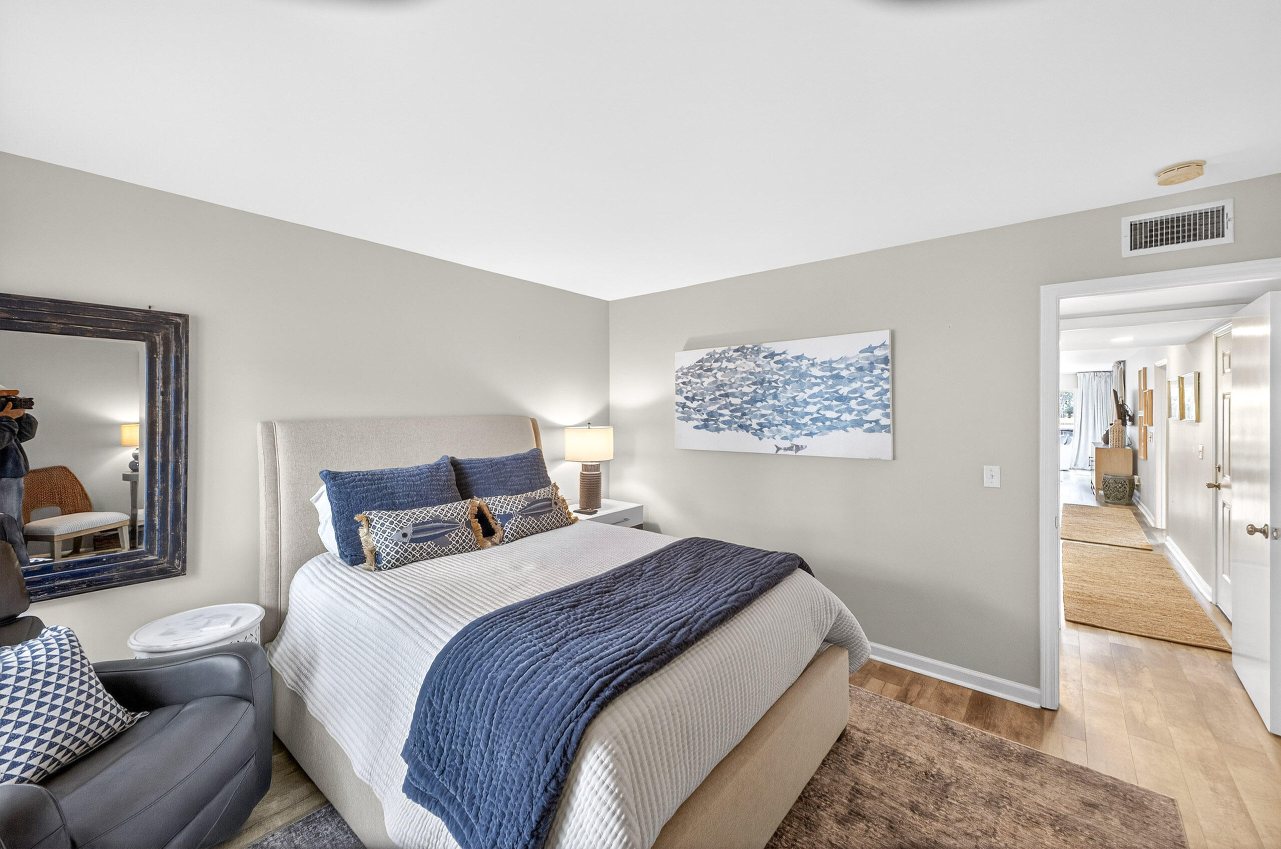 900 Harbour Point Lane, Unit 900 Miramar Beach, FL 32550 - Photo 27 of 64 a bedroom with bed and a couch