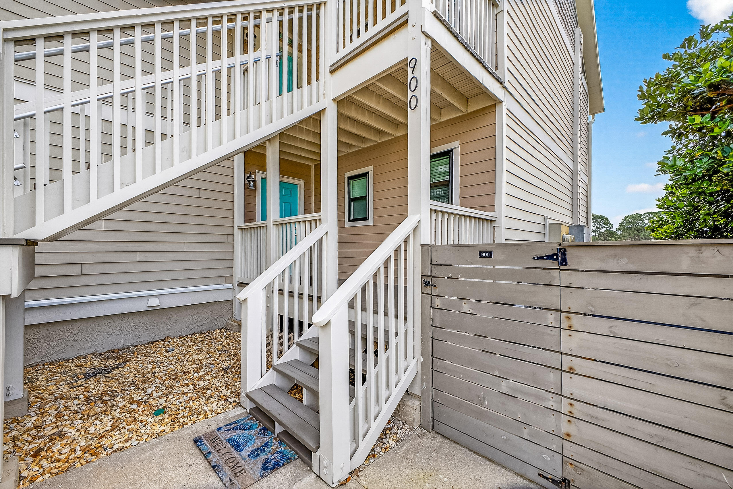 900 Harbour Point Lane, Unit 900 Miramar Beach, FL 32550 - Photo 33 of 64 a view of wooden house with a small yard