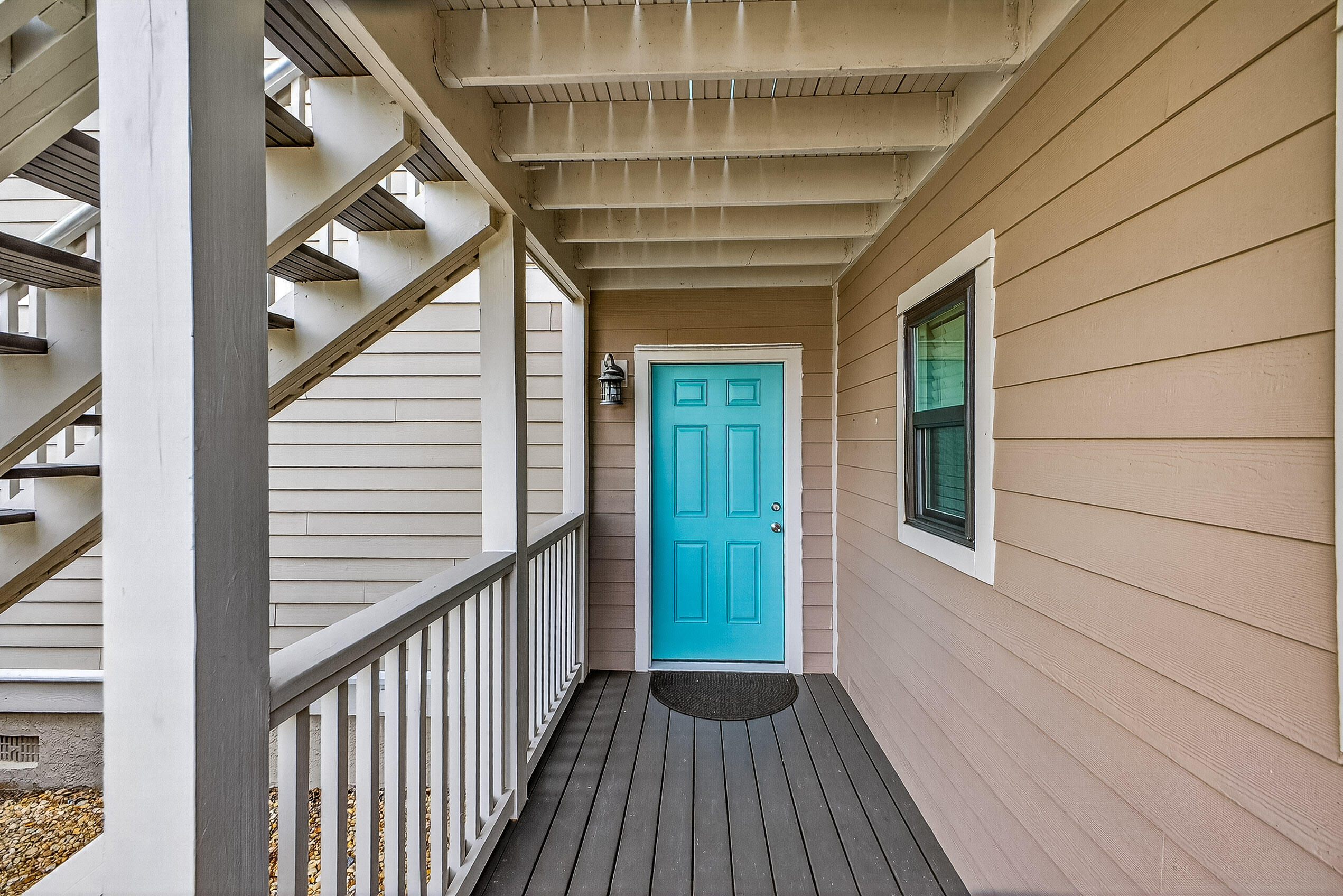 900 Harbour Point Lane, Unit 900 Miramar Beach, FL 32550 - Photo 34 of 64 a view of balcony with wooden floor and stairs
