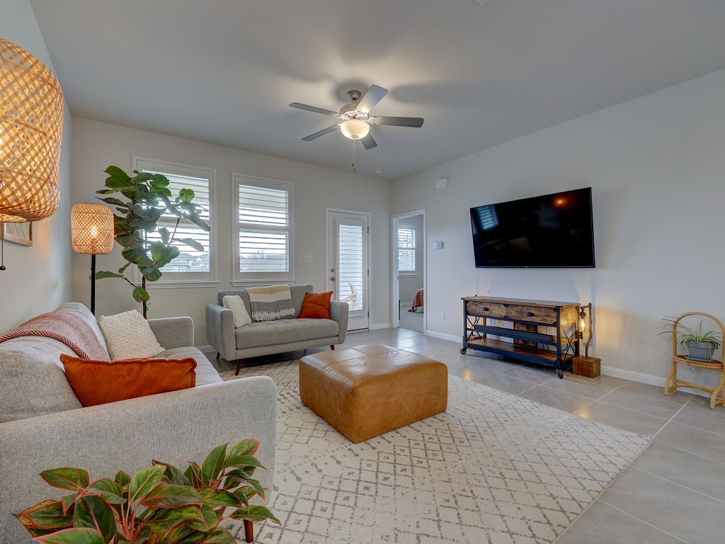 325 Serpens Street Georgetown, TX 78628 - Photo 13 of 40 Another living view - TV mount will stay for tenant