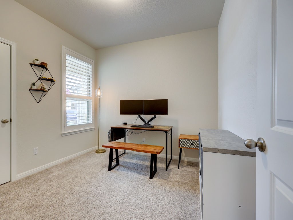325 Serpens Street Georgetown, TX 78628 - Photo 21 of 40 Bedroom 3 has walk in closet